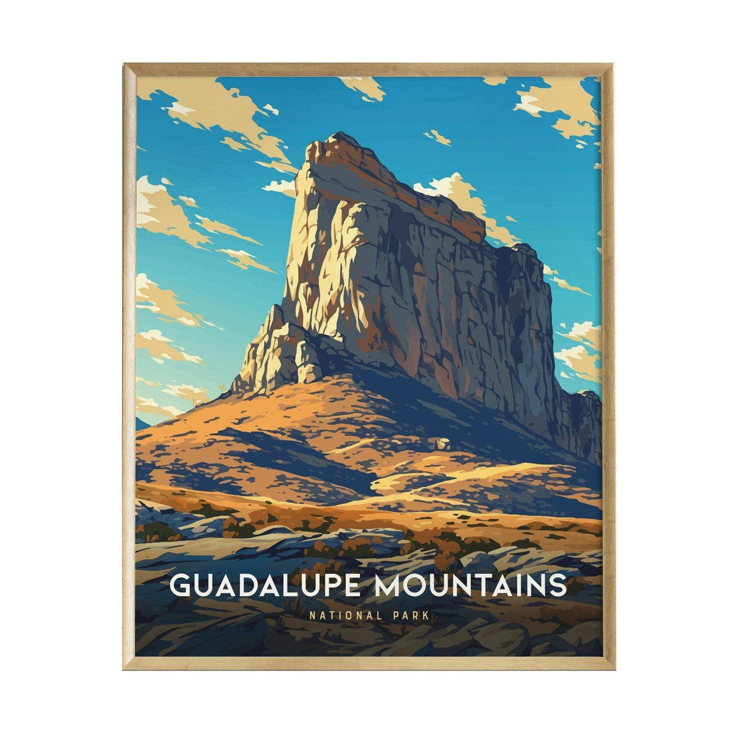 A framed poster of the Guadalupe Mountains showcases a vibrant illustration of a prominent rock formation against a backdrop of blue skies and fluffy clouds.