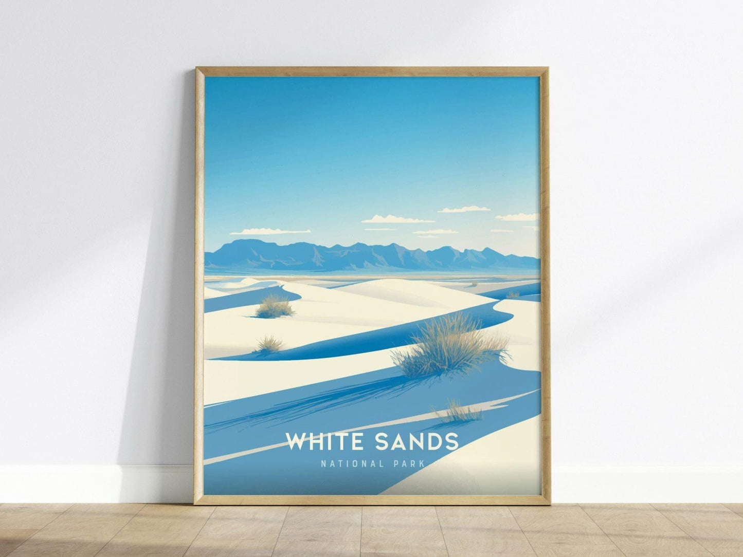 Framed poster of White Sands National Park with a blue sky and white sand dunes.