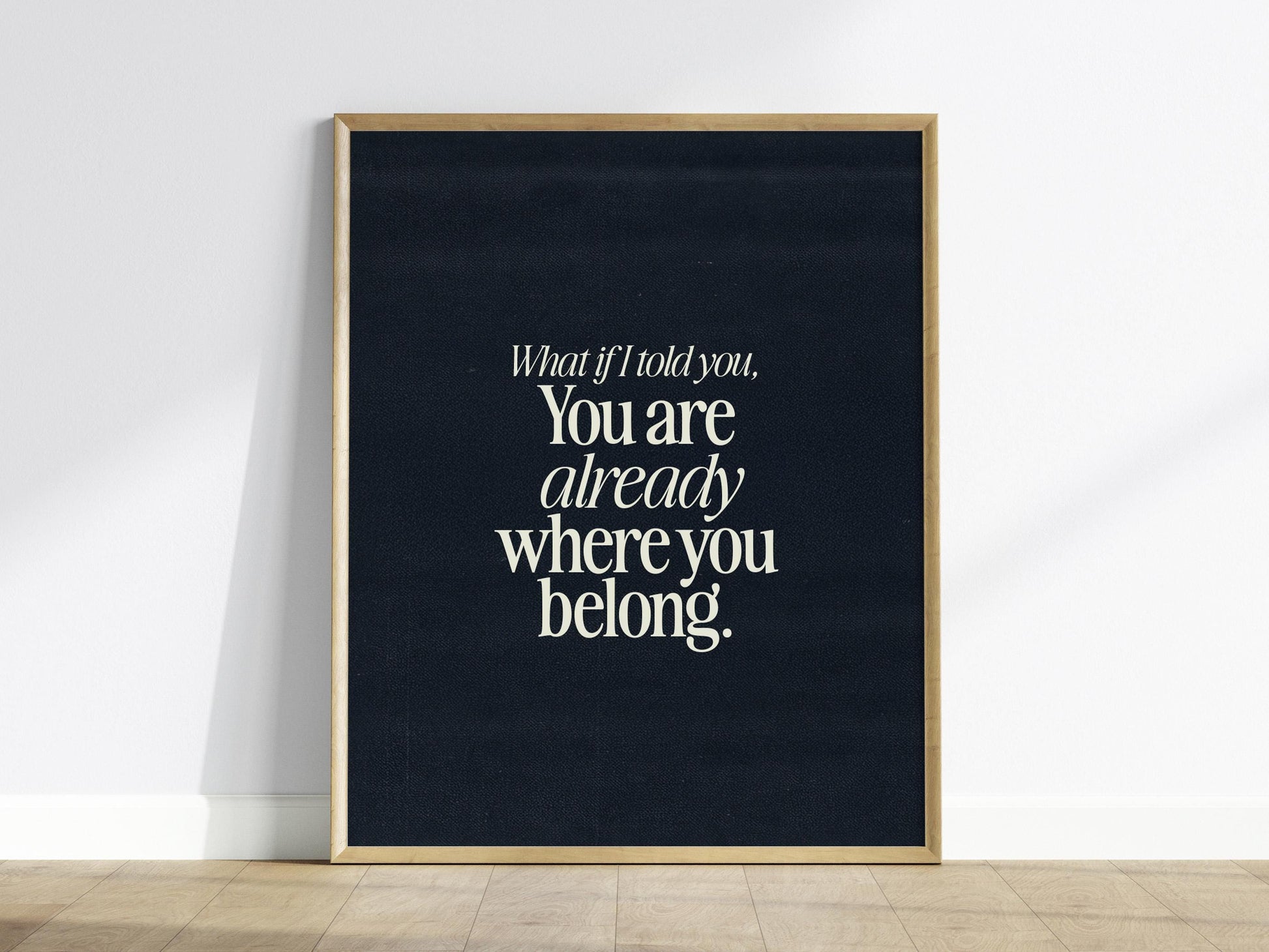 Framed poster with motivational quote on a black background