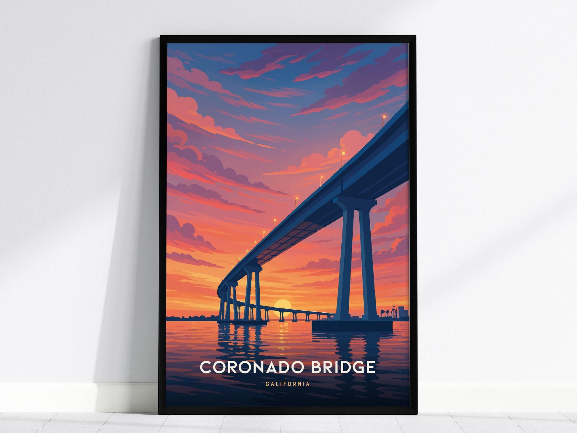 Framed artwork of the Coronado Bridge at sunset with vibrant colors.