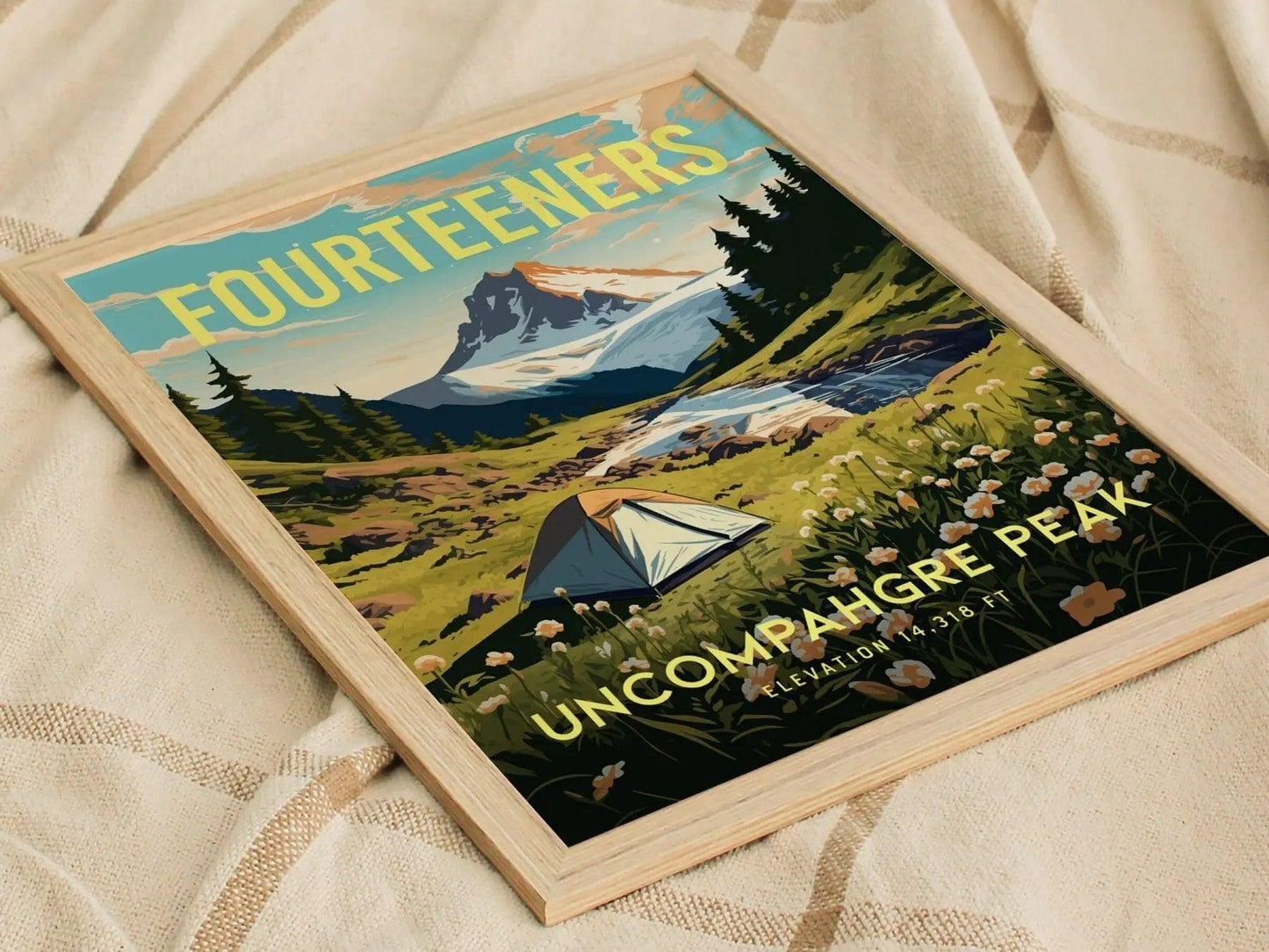 Framed artwork of a mountain landscape with a tent, titled 'Fourteeners Uncompahgre Peak'.