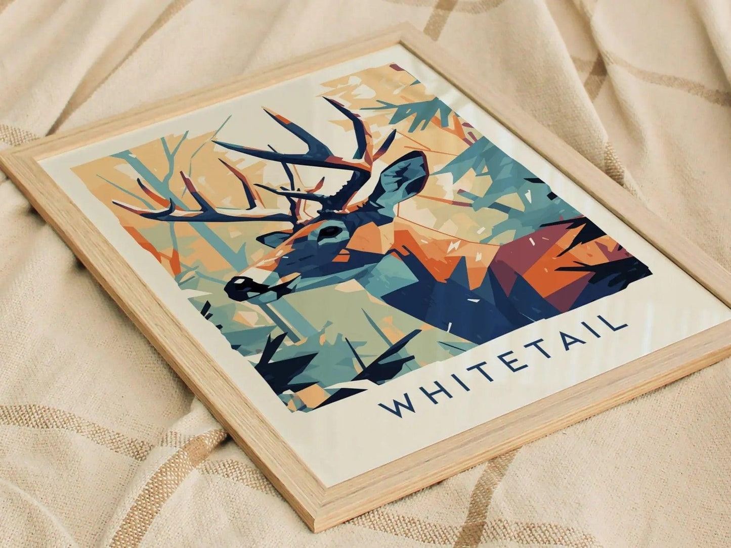 Framed artwork of a deer with 'Whitetail' text on a textured fabric background