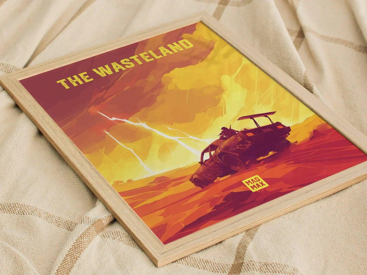 Poster titled 'The Wasteland' with a desert scene and vehicle on a textured surface
