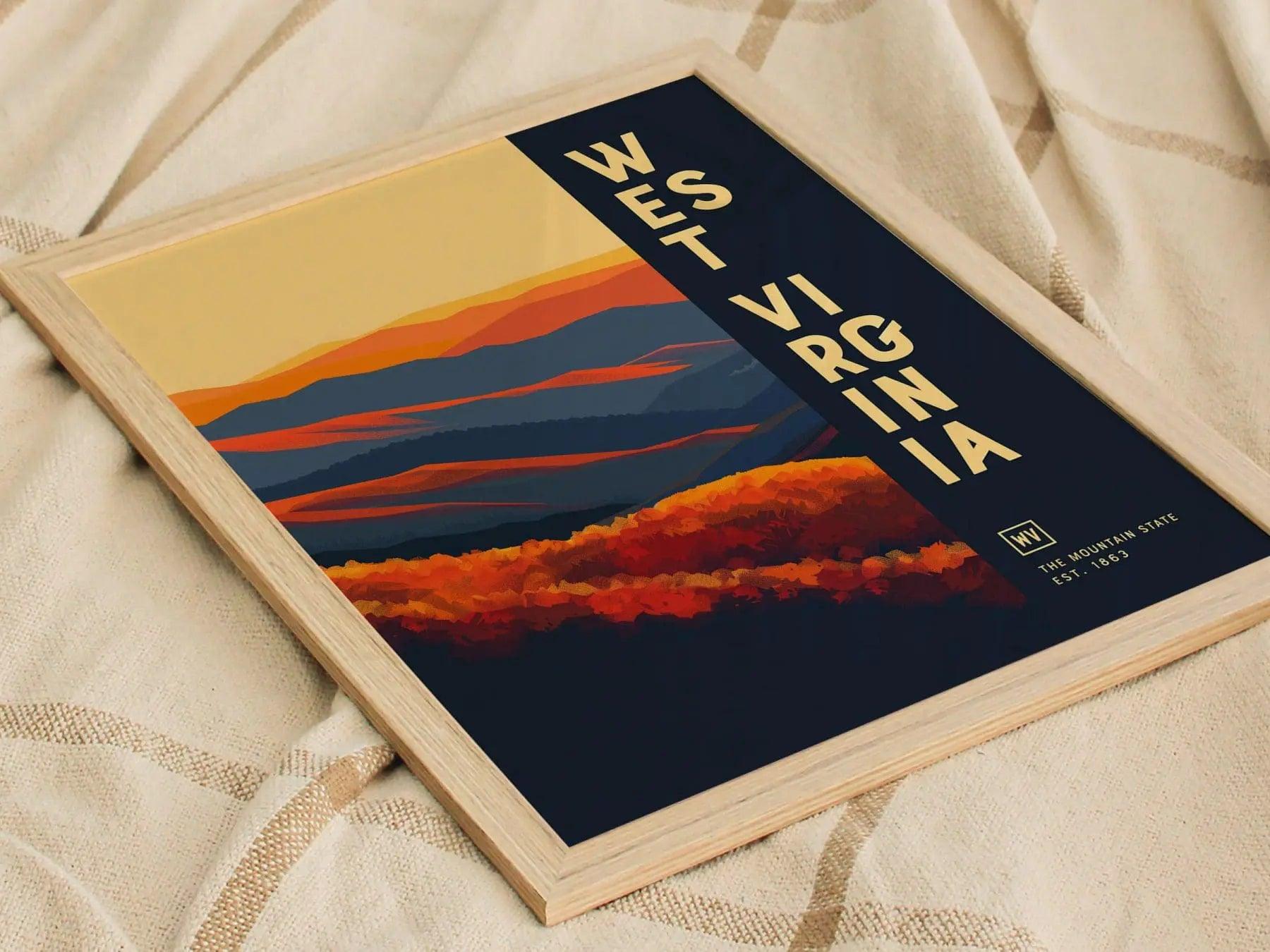 Framed artwork of West Virginia with a mountain landscape design.