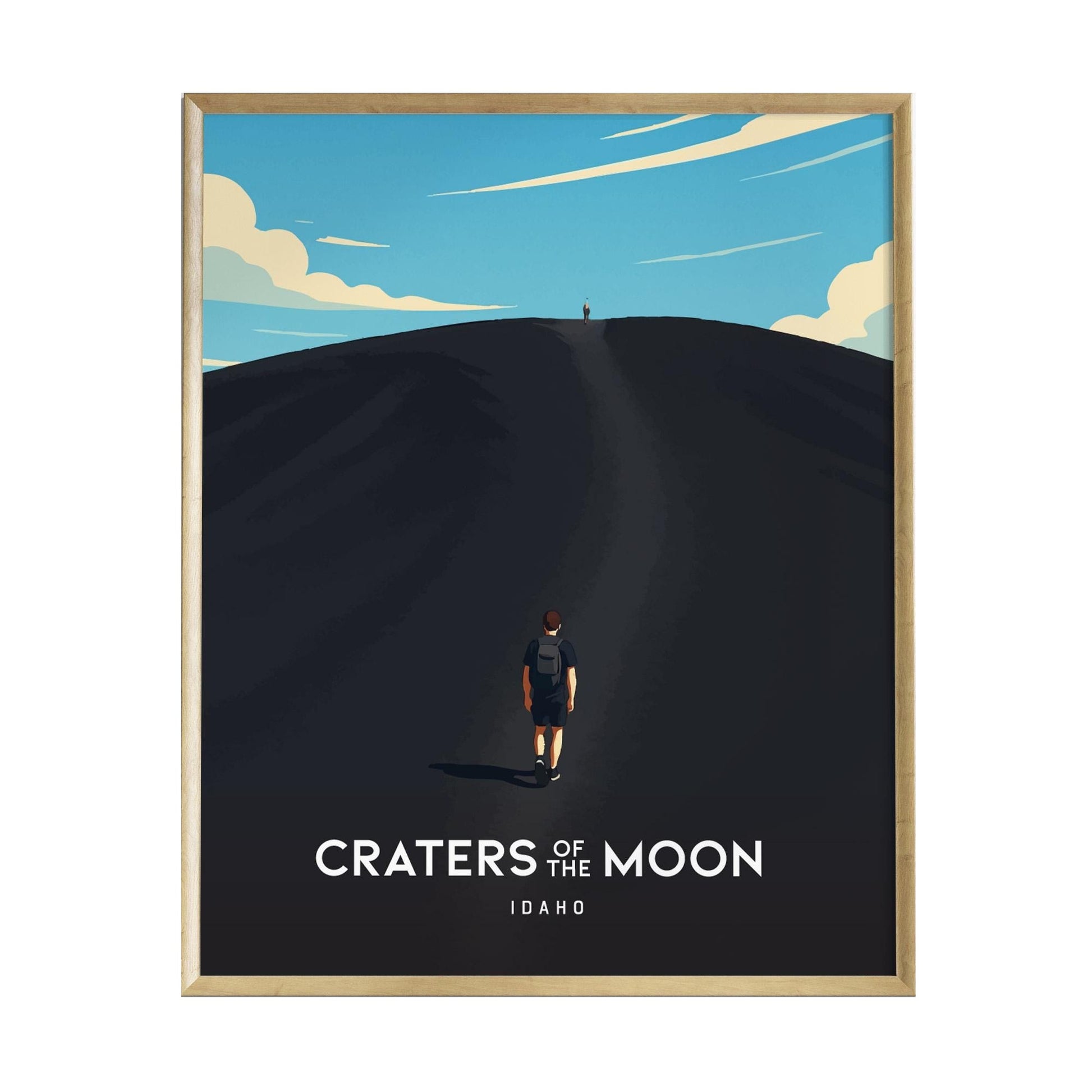 A vintage-modern art print titled Craters of the Moon depicts a lone hiker ascending a dark cinder cone under a bright blue sky with scattered clouds. The poster captures the rugged beauty of Idahos volcanic landscape, inviting adventure.