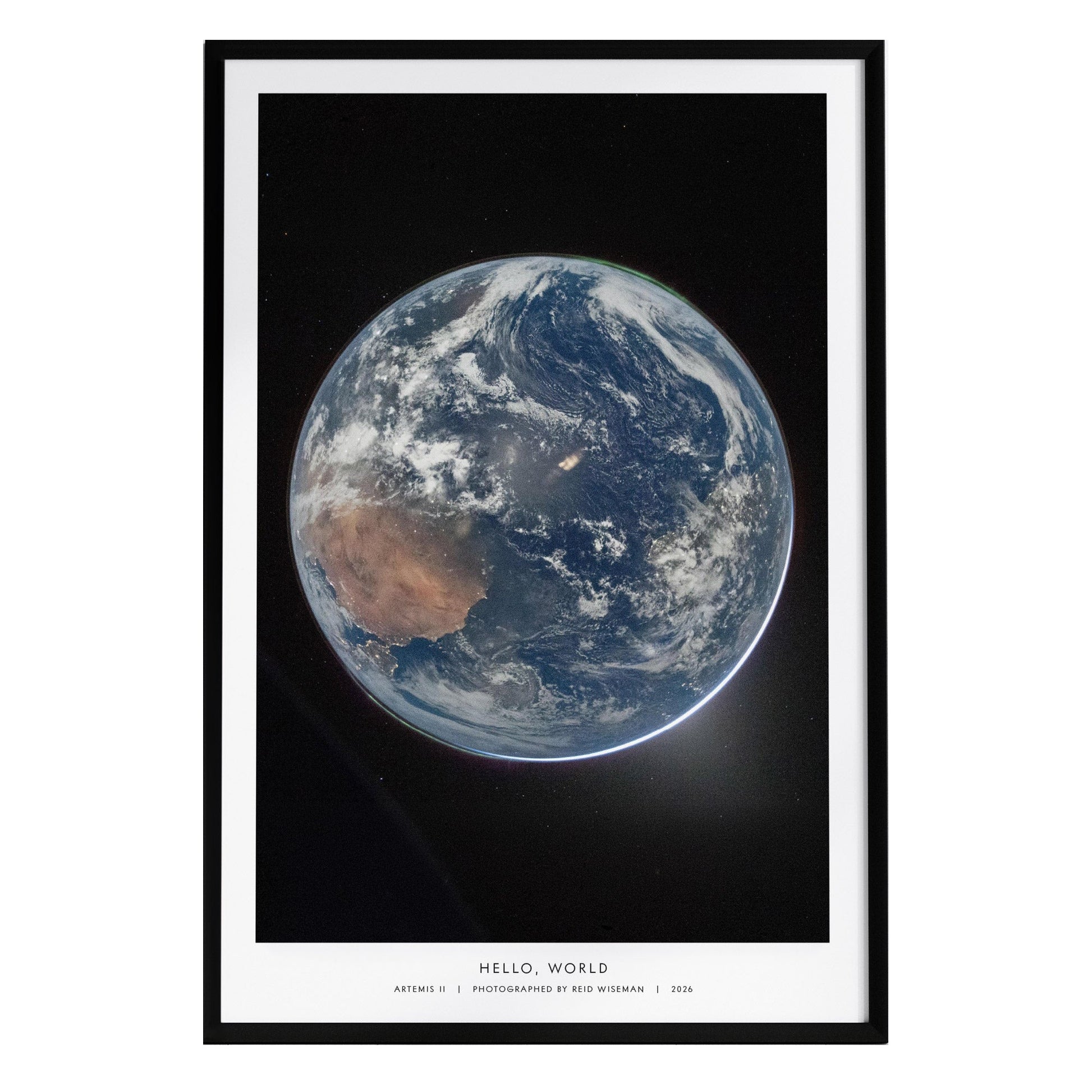 A framed poster featuring a stunning view of Earth from space, showcasing rich blue oceans, swirling white clouds, and landmasses.