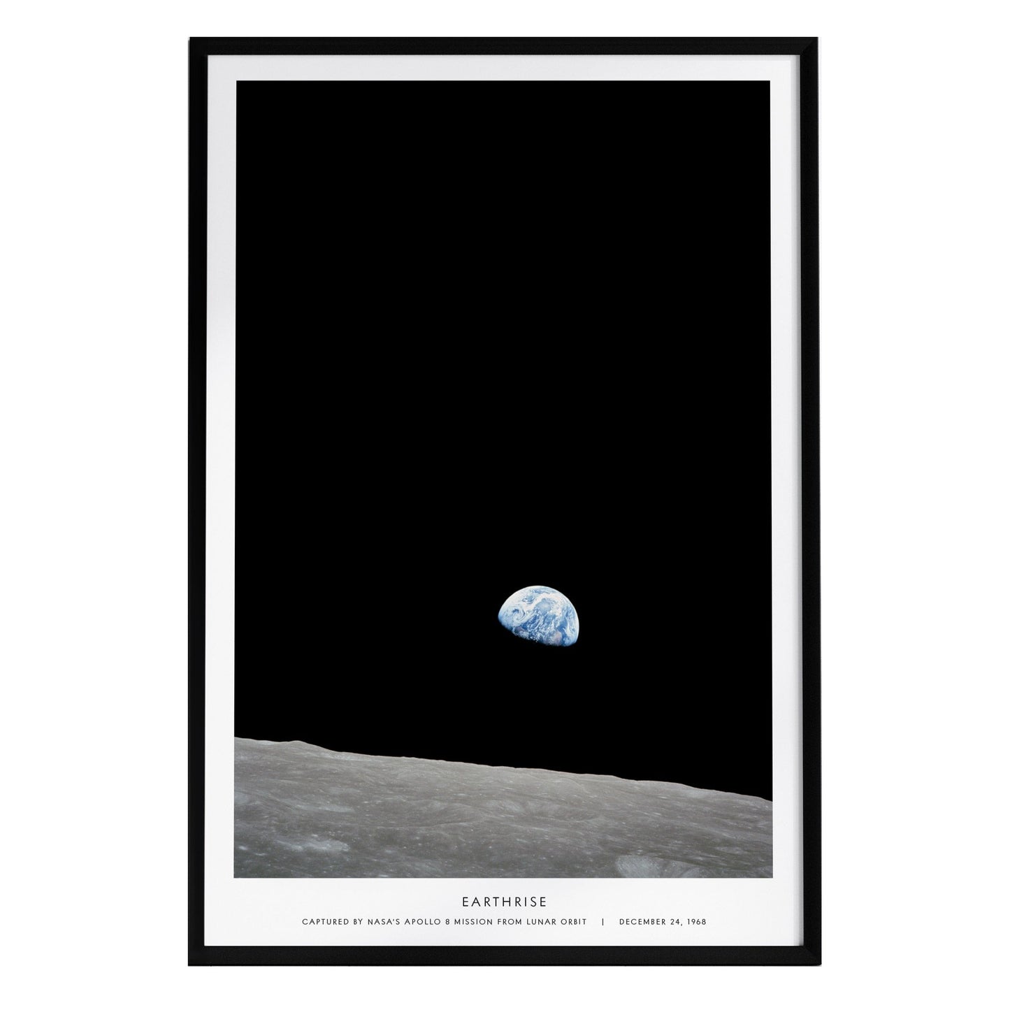 A framed poster titled Earthrise displays the iconic view of Earth rising above the lunar horizon, captured during the Apollo 8 mission. The dark background highlights the fragile blue planet against the stark lunar surface.