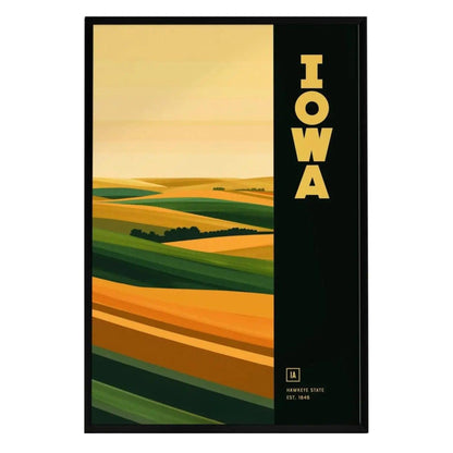 A framed Iowa poster features a stylized landscape of rolling prairies and geometric farm fields, showcasing vibrant green and golden hues. The bold lettering IOWA is prominently displayed alongside the state establishment year, 1846.