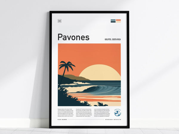 A framed poster featuring a stylized illustration of a sunset over a tropical ocean wave with palm trees and hills, labeled Pavones, Golfo Dulce, Costa Rica.