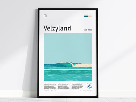 Framed poster featuring a minimalist design of turquoise waves under a clear sky, titled Velzyland with additional text about Oahu, Hawaii. The poster leans against a white wall.