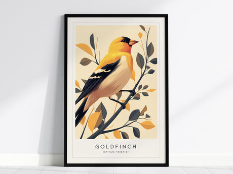 Framed print of a goldfinch perched on a branch with yellow and gray leaves, set against a light background. The word Goldfinch is printed below the image.