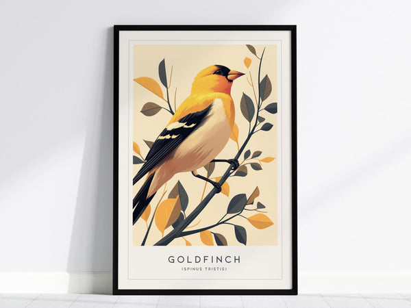 Framed print of a goldfinch perched on a branch with yellow and gray leaves, set against a light background. The word Goldfinch is printed below the image.