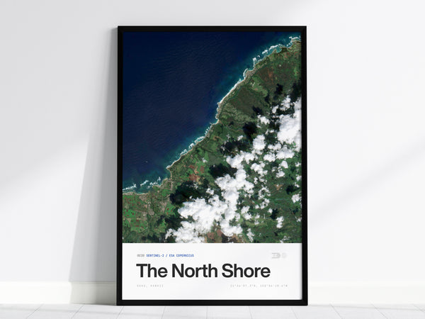 Framed satellite print of Oahu's North Shore, showcasing vibrant blues of the ocean and lush greens of the coastline, perfect travel art.