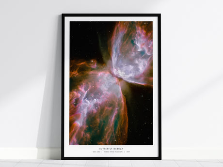 Vibrant Butterfly Nebula poster featuring symmetrical wings of gas and dust, framed art inspired by Hubble NASA photography.