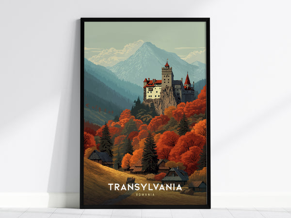 A framed poster depicts a dramatic hilltop castle surrounded by vibrant autumn forests and layered mountain silhouettes. The text Transylvania Romania is visible at the bottom, enhancing the travel-poster style.