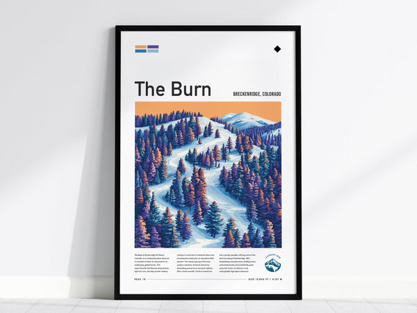 Framed poster of a scenic ski run at Breckenridge, Colorado, featuring snow-covered mountains, colorful pine trees, and a warm sunset sky. The poster is titled The Burn.