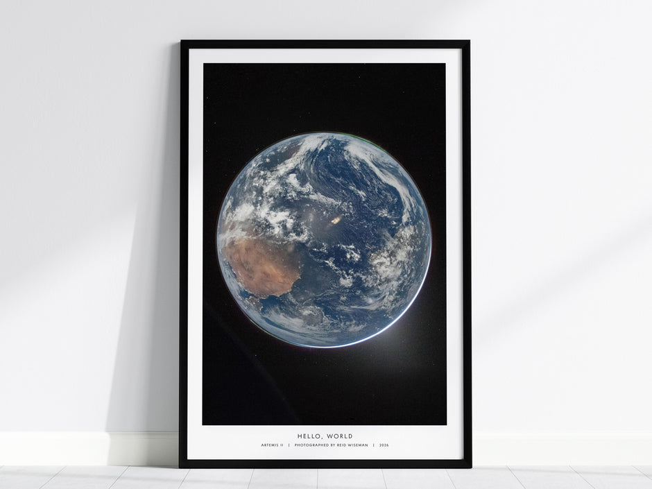 Framed Earth from space poster showcasing vivid blues, greens, and browns, highlighting our planet's beauty in space art.