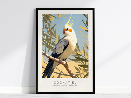 A framed poster depicts a cockatiel with a striking crest and vibrant orange cheeks, perched on a branch against a backdrop of green leaves and a blue sky.