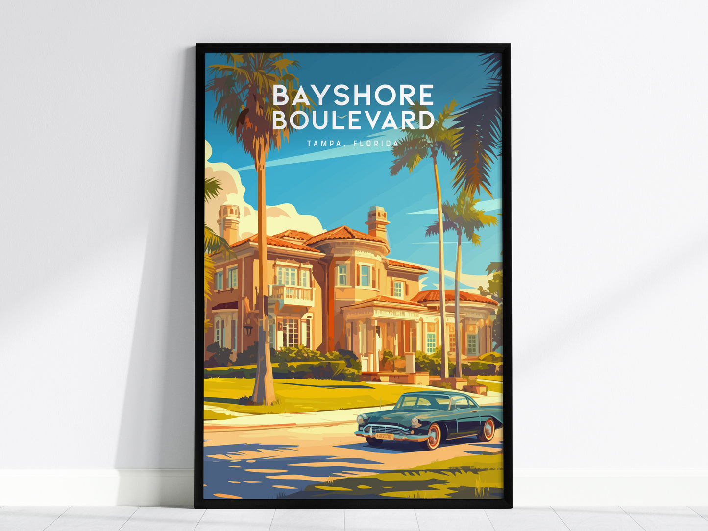 A vibrant poster depicts a classic car driving past a grand estate lined with tall palm trees under a clear blue sky, titled Bayshore Boulevard Tampa, Florida.