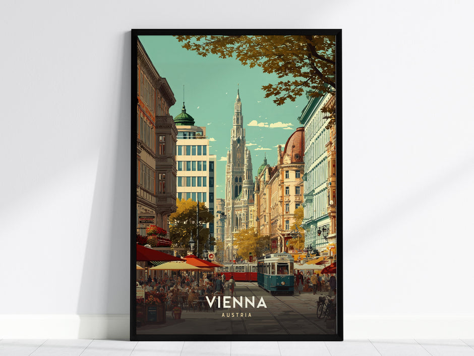 Framed Vienna cityscape poster featuring a historic tower, vibrant street scene with tram, colorful umbrellas, and warm earth tones.