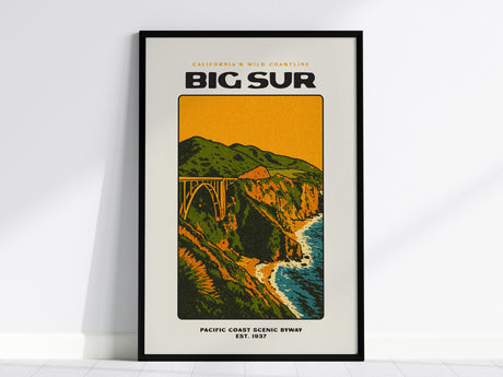 This poster, featuring the text Big Sur and Pacific Coast Scenic Byway, showcases a stylized illustration of a coastal landscape with a bridge and cliffs. The wall art captures the vibrant colors of Californias wild coastline.