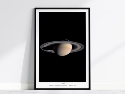 Saturn NASA poster featuring Cassini spacecraft image of planet and ring system against black space background