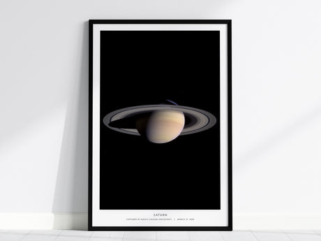 Saturn NASA poster featuring Cassini spacecraft image of planet and ring system against black space background