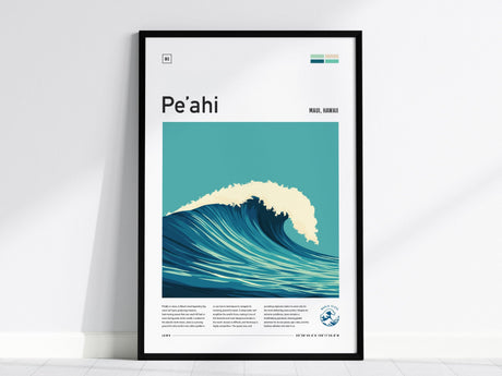 Framed poster of a stylized wave with teal and cream colors, labeled Peahi, Maui, Hawaii. The artwork is displayed against a plain white wall.