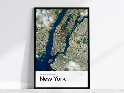 Framed aerial poster of New York City showcasing satellite view with Central Park, vibrant waterways, and urban neighborhoods.