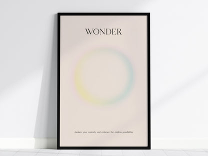 Framed WONDER wall art print featuring a pastel gradient design with soft pink, yellow, and blue hues, perfect for travel art décor.