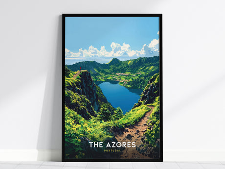 Framed artwork of a mountain landscape with a lake, labeled 'The Azores', on a white wall.