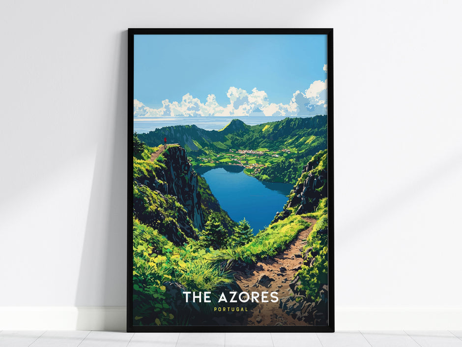 Framed artwork of a mountain landscape with a lake, labeled 'The Azores', on a white wall.