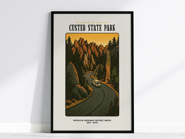 This image shows a vintage-style poster for Custer State Park, featuring a winding road through stylized granite peaks and dense forest. A vehicle is driving along the road under a golden sky.