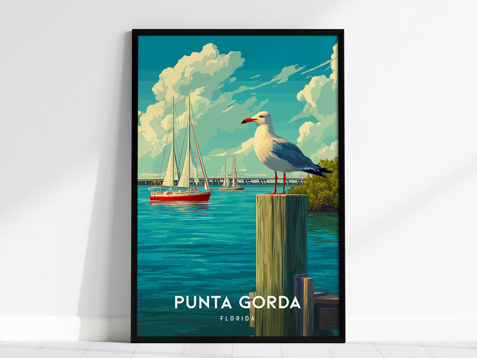 Framed Punta Gorda Coastal Poster featuring a seagull on a post, sailboats on blue water, and a sunny sky, perfect travel art.