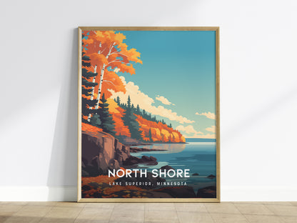 A framed poster featuring a vibrant illustration of North Shore, Lake Superior, showcases autumnal trees with orange and yellow leaves along a rocky coastline.