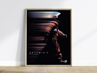 Framed Artemis II mission poster hanging on a white wall in a modern living room
