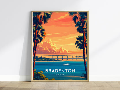 Framed artwork of Bradenton, Florida with palm trees and a bridge over water.