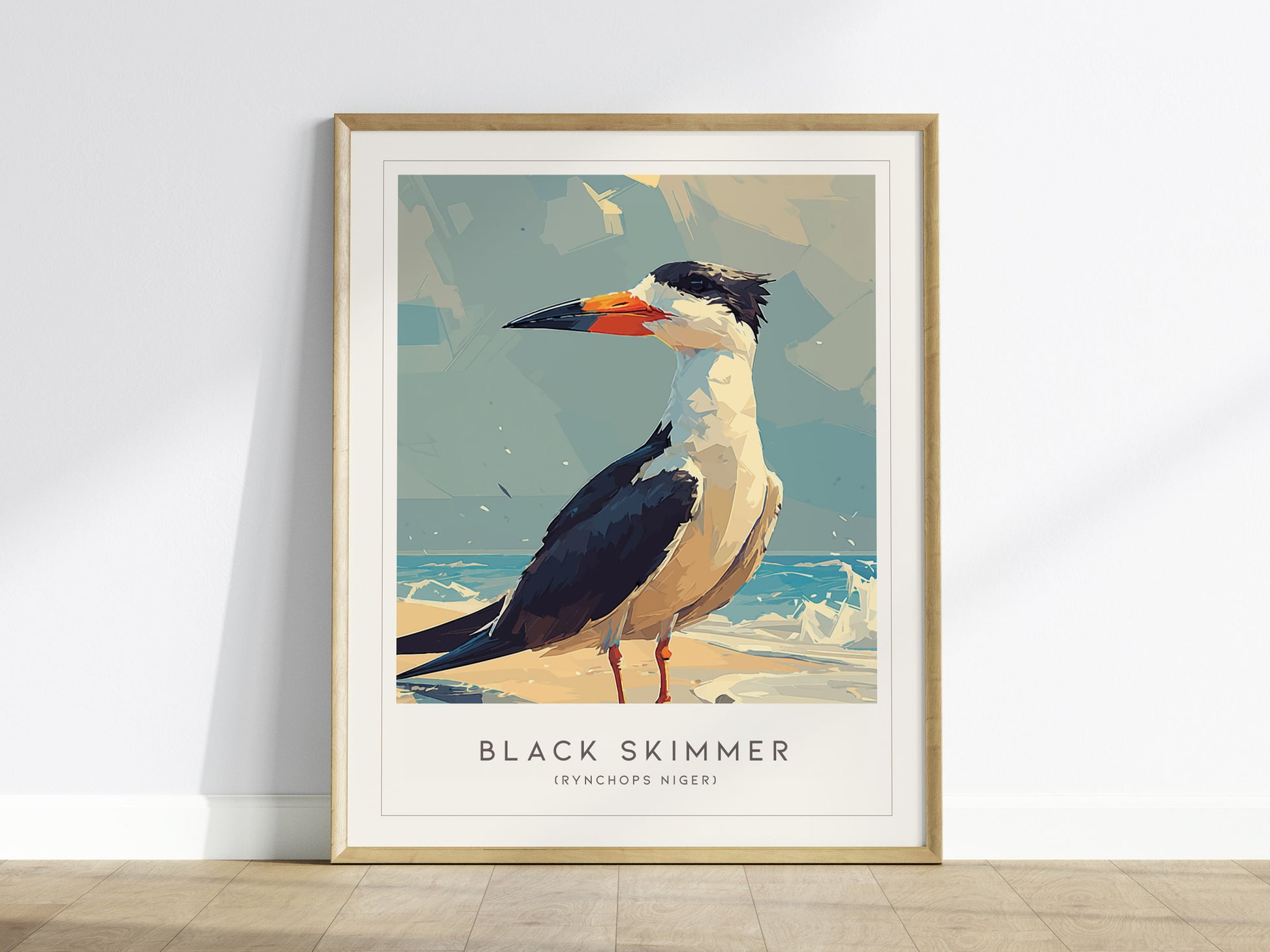 A framed poster featuring a stylized illustration of a Black Skimmer, a coastal shorebird, standing on a sandy beach with a backdrop of blue skies and gentle waves.