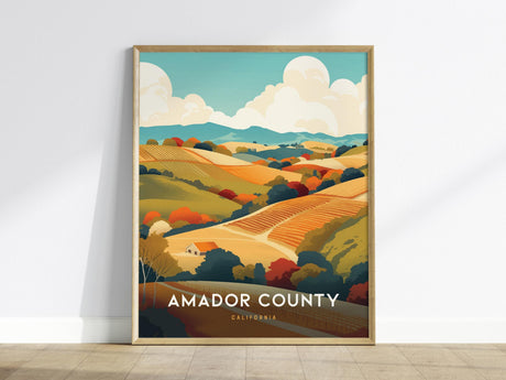 Framed poster featuring a colorful illustration of Amador Countys rolling vineyards, with vibrant hills and a clear sky. The artwork captures the scenic beauty of Californias wine country.
