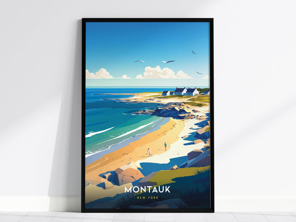 A framed poster depicts a scenic coastal view with a sandy beach, rocky shoreline, and a few small houses in the distance under a clear blue sky. Birds fly above, and the word Montauk is prominently displayed at the bottom.
