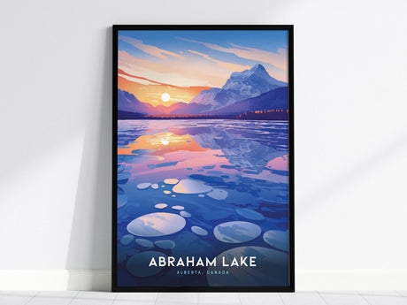 Framed poster depicting Abraham Lake in Alberta, Canada, showcasing a vibrant sunset over the mountains with reflections on the icy water.