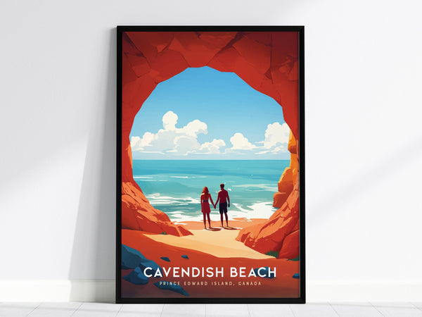 A framed poster features an illustration of a couple holding hands, standing in a rocky archway overlooking a serene ocean view with blue skies and clouds. The text reads Cavendish Beach, Prince Edward Island, Canada.
