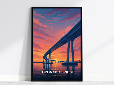 Framed poster of the Coronado Bridge in San Diego, featuring a vibrant illustration with the bridges elegant curve over a sunset-lit bay. The sky is painted in warm tones of orange, purple, and gold, creating a magical atmosphere.