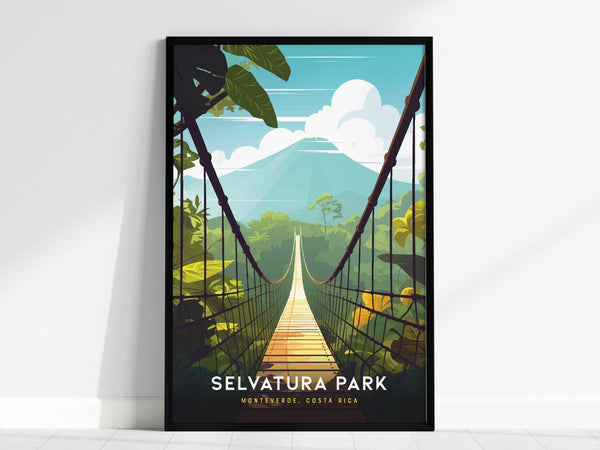 A framed poster of Selvatura Park in Monteverde, Costa Rica, depicting a hanging bridge over a lush green forest with mountains in the background under a blue sky. The artwork is vibrant and eye-catching.
