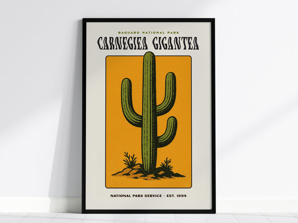 A framed poster featuring a vintage-style illustration of a saguaro cactus against a bold orange background. The text reads Saguaro National Park and Carnegiea Gigantea, perfect for wall art enthusiasts.