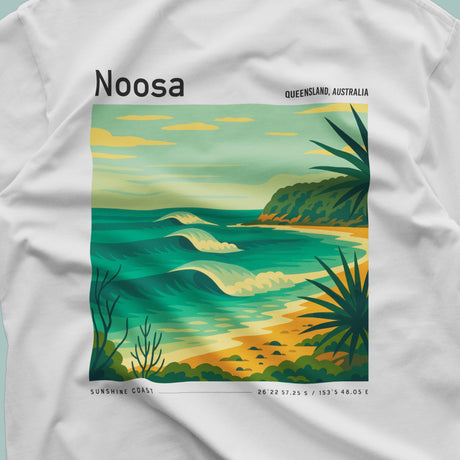 White t-shirt with a Noosa, Queensland, Australia beach graphic design.