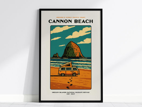 A framed vintage-style poster of Cannon Beach, Oregon, featuring Haystack Rock against a colorful sky with clouds. A yellow camper van is parked on the sandy beach, with retro typography above.