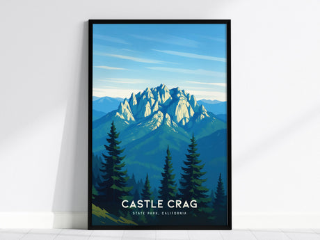 A framed poster depicting Castle Crags State Park features dramatic granite spires rising above lush pine forests under a blue sky. The text at the bottom reads Castle Crag State Park, California.