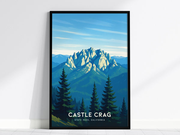 A framed poster depicting Castle Crags State Park features dramatic granite spires rising above lush pine forests under a blue sky. The text at the bottom reads Castle Crag State Park, California.