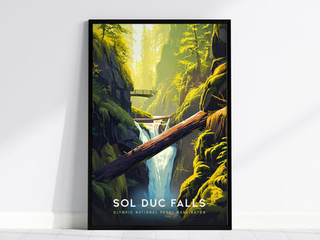 The image shows a framed poster of Sol Duc Falls with a vintage design, featuring a split waterfall cascading amidst lush green moss-covered rocks and trees.